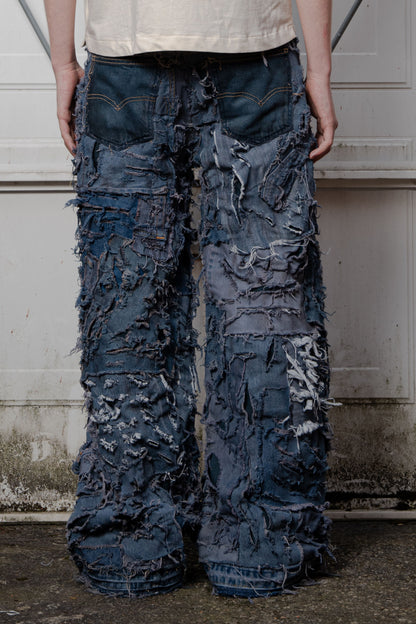 SLASHED JEANS