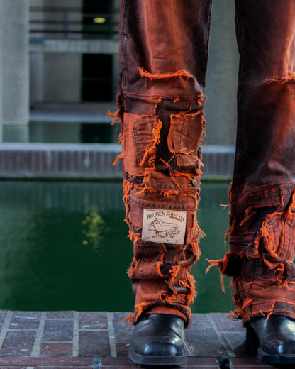 ASYMMETRICAL WAXED PANEL JEANS